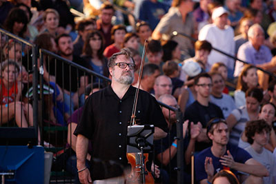 Todd Reynolds performing in Allison Orr's PowerUp in Austin, with a score by Graham Reynolds. Photo by Amitava Sarkar.