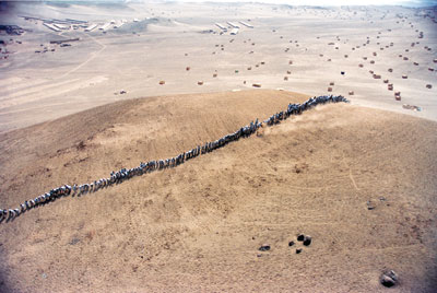 Francis Alys, When Faith Moves Mountains, 2002.  15 minutes, 6 seconds.  In collaboration with Cuauhtemoc Medina and Rafael Ortega.  16 mm film transferred to DVD.  