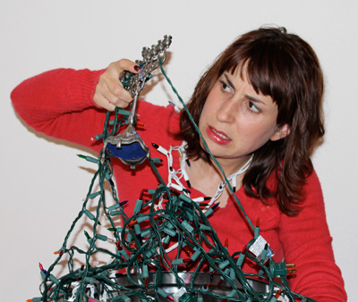 Abby Koenig in The Jew Who Loves Christmas, a multi-media installation and storytelling event at Fresh Arts through Dec. Photo by Rob Murphy.  