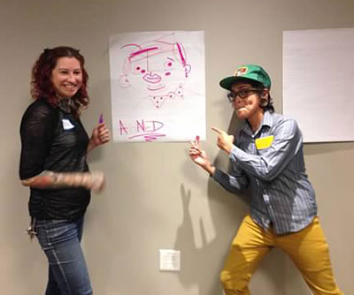 Mental health peer Jessica Saner and artist Claudio Gizell Aparcio Gamundi draw together at a workshop for the 4 Plus 4 Equals project.