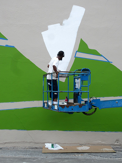 An early stage of The People’s Plate, a mural by Otabenga Jones & Associates at the Lawndale Art Center. Photo: Devon Britt-Darby.