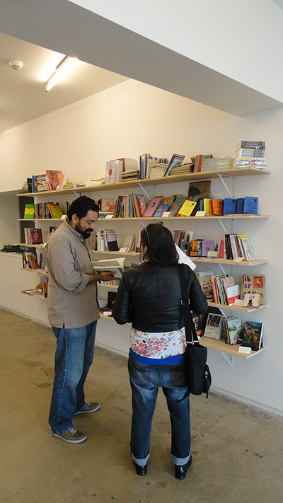 Visitors to the exhibition Antena @ Blaffer, Blaffer Art Museum, Houston Photography: Kaia Sand; Courtesy the artists and Blaffer Art Museum.