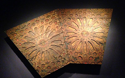 Part of a ceiling (detail), Fez (Morocco), 18th century. Cedar wood; carved and painted with natural pigments. Musée Nejjarine des Arts et Métiers du Bois, Fez, Morocco, 98-158 and 159. Fondation Mohammed Karim Lamrani pour l’Ensemble Nejjarine. On view in Nur: Light in Art and Science from the Islamic World at the Dallas Museum of Art. Photo: Devon Britt-Darby.