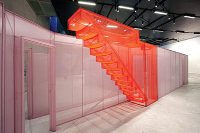 Do Ho Suh, Apartment A, Unit 2, Corridor and Staircase, 348 West 22nd Street, New York, NY 10011, USA, 2011–2012. Polyester fabric and stainless steel tubes. Apartment A, 271 2/3 x 169 3/10 x 96 7/16 inches. Unit 2, 422 7/16 x 228 1/3 x 96 1/16 inches. Corridor and Staircase, 488 3/16 x 66 1/8 x 96 7/16 inches. Courtesy the artist and Lehmann Maupin, New York and Hong Kong.