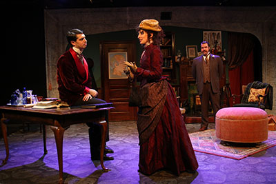 John Johnston as Sherlock Holmes and Amelia Fischer as Helen Stoner in Classical Theatre's production of The Speckled Band: An Adventure of Sherlock Holmes. Photo by Pin Lim. 