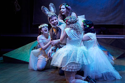 Drake Simpson as Bottom with (left to right) Molly Searcy, Hannah Kreig, Skyler Sinclair, and Regina Ohashi as Fairies.