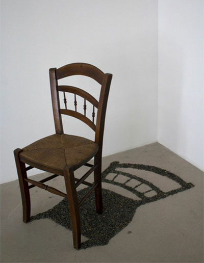 Michael Crowder, Zone d' ombre. Antique chair, pebbles. Photo courtesy of Gray Contemporary.