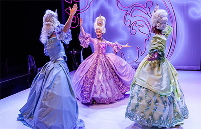 Emily Neves, Kelley Peters and Robin LeMon in Stages Repertory Theatre’s production of Marie Antoinette, with costumes by Barry Doss. Photo by Amitava Sarkar. 