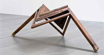 Ai Weiwei, Table with Two Legs, 2008, wooden Qing dynasty table (1644-1911), 23 3/4 x 65 x 37 in. (60.5 x 165 x 94 cm), Courtesy of Rubell Family Collection, Miami, Photography by Chi Lam.
