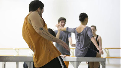 Mario Zambrano working with Hubbard Street Dance Chicago working with Ayman Harper set William Forsythe's One Flat Thing Reproduced. Photo courtesy of the artist.