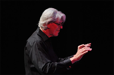 Robert Simpson, Founder and Artistic Director of Houston Chamber Choir, conducts an evening of Sinatra hits at Miller Outdoor Theater for an audience of thousands, October 2015. 