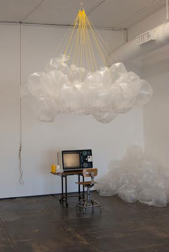 Nick Vaughan & Jake Margolin Spiritus: Norma Trist As A Volume of Captured Breath, 2016 performance relic including plastic bags, nylon twine, rope, hardware, microfiche and viewer, desk, chair and scissors dim. variable.