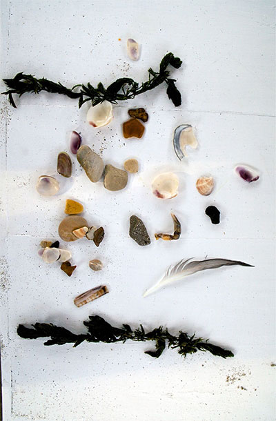 Abinadi Meza, found materials used in performance at the sea, Fregene, Italy, Photo by Stefano Canto.
