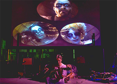 Acoustic Nerves, a city-funded experimental performance, was shut down by the fire marshall. Pictured: Dean Terry at center, behind (Clockwise from bottom left: Hannah Weir, Abel Flores, and Hilly Holsonback). Photo by Alisa Eykilis.