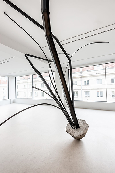 Monika Sosnowska, Untitled, 2015. Concrete and painted steel. 119 1/4 x 127 1/2 x 157 1/2 inches. Installation view, Monika Sosnowska: Still Life, Foksal Gallery Foundation, Warsaw. Artwork © Monika Sosnowska. Courtesy the artist; Foksal Gallery Foundation, Warsaw; The Modern Institute, Glasgow; Galerie Gisela Capitain, Cologne; kurimanzutto, Mexico City; and Hauser & Wirth. Photograph by Bartosz Górka.