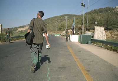 Francis Alys, The Green Line (Sometimes doing something poetic can become political and sometimes doing something political can become poetic), 2005, video projection.