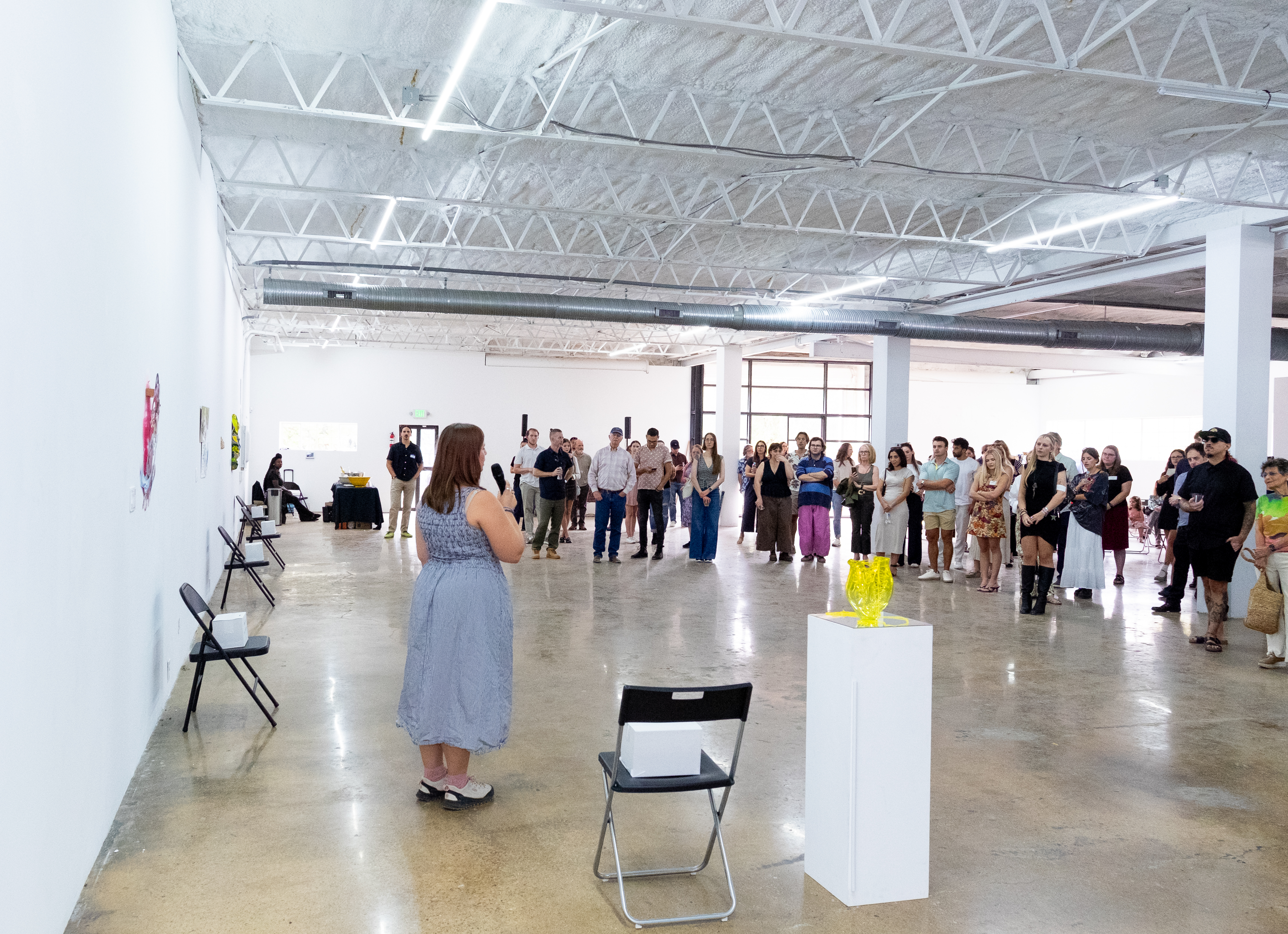 Gretchen Stark of Texas Christian University addressing the crowd at the CADD MFA Showcase