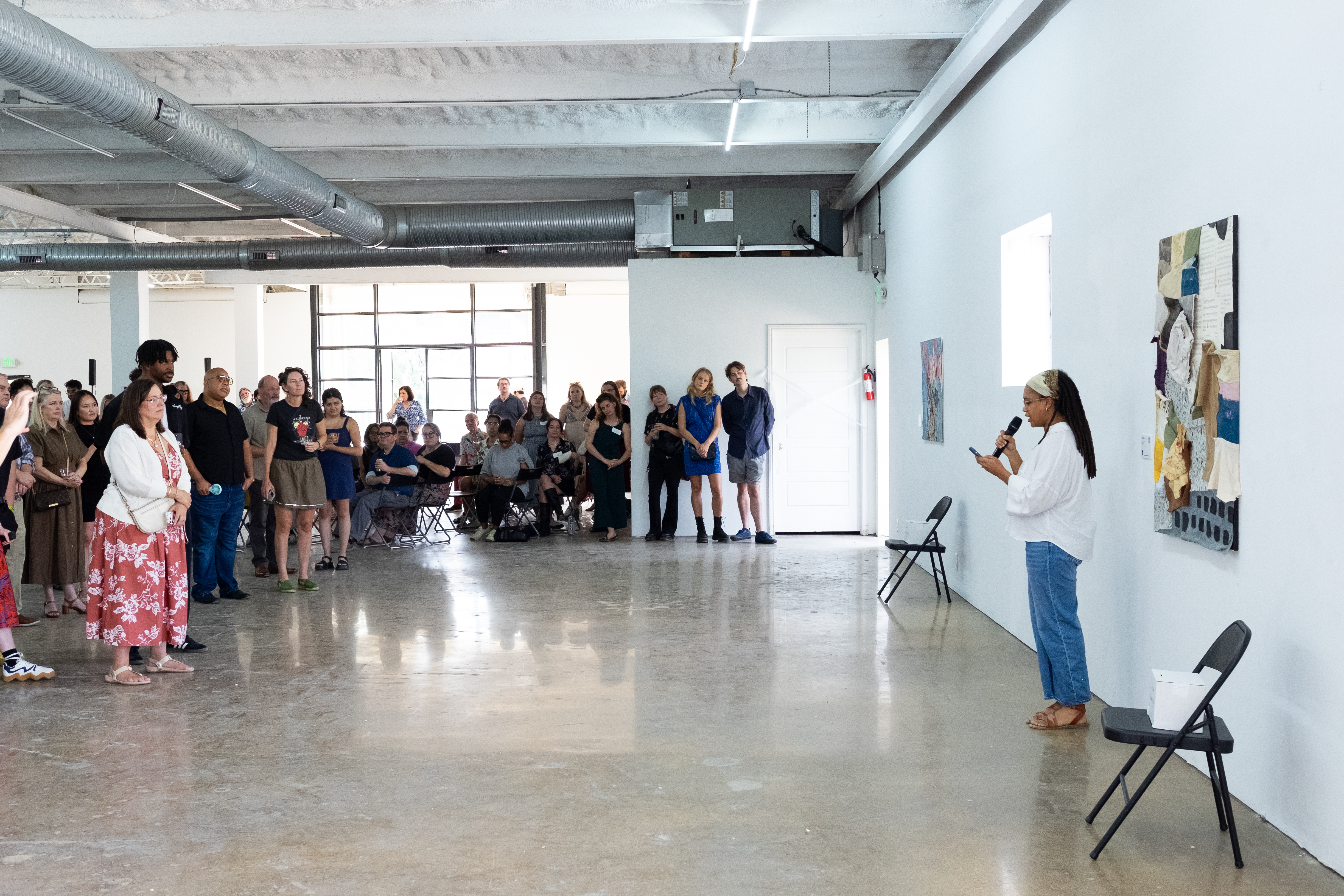 Niel Brandon of Texas Woman’s University addressing the crowd at the CADD MFA Showcase