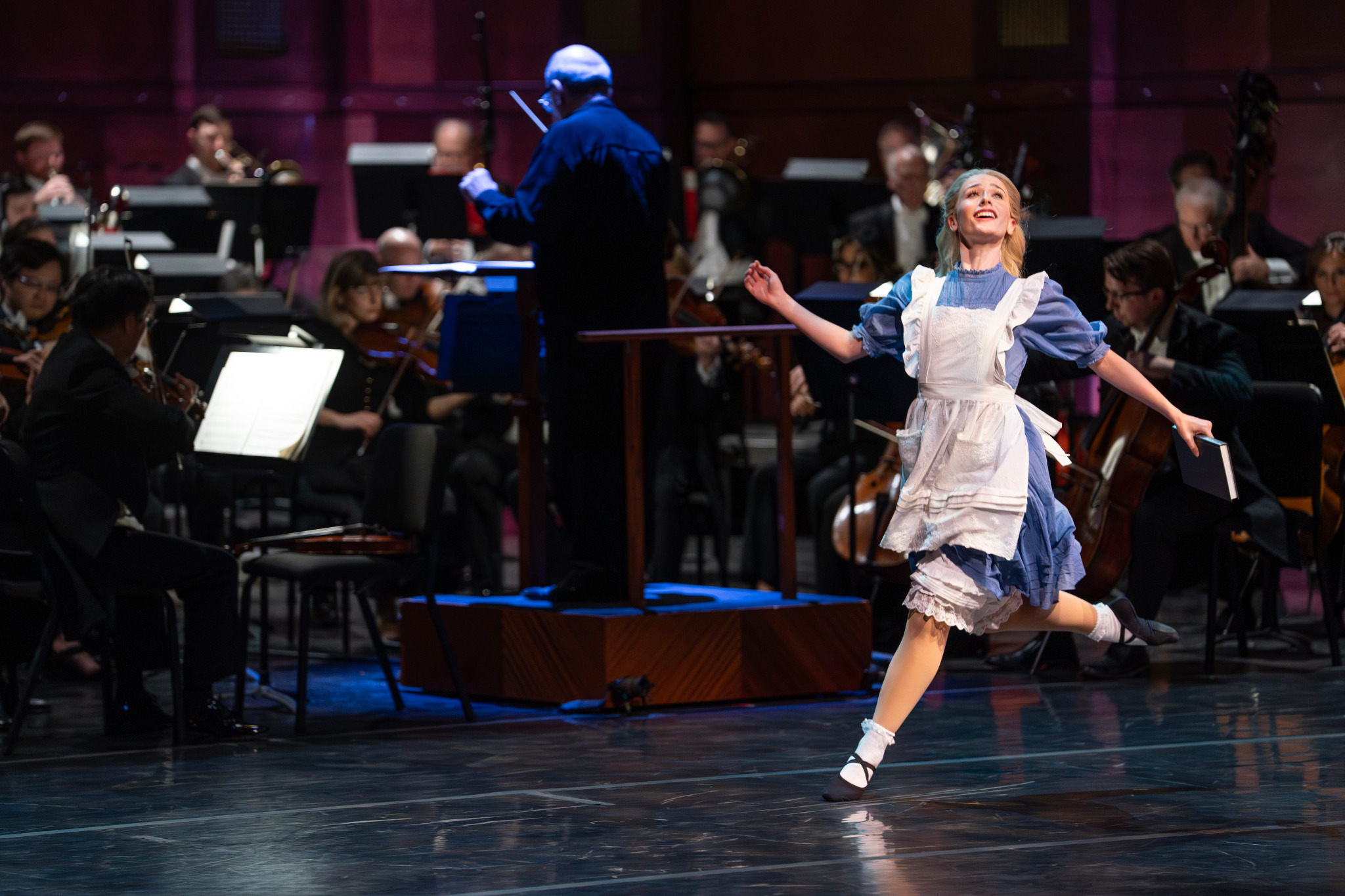 Stephanie Godsave as Alice in Joy Bollinger’s Alice's Adventures In Wonderland with Conductor Robert Spano and Fort Worth Symphony Orchestra, commissioned by FWSO, 2025. Photo by Karen Almond.