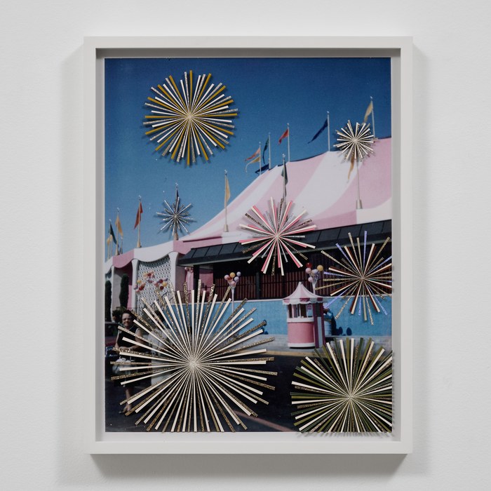 Framed circus collage with a pink tent and decorative starbursts.